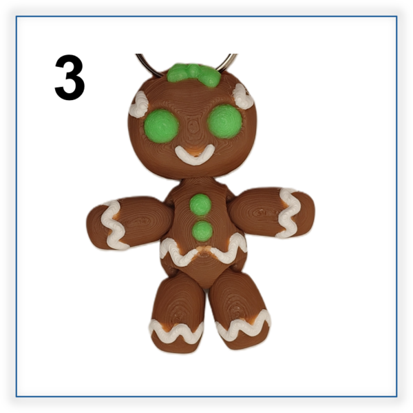 #3 3D printed traditional gingerbread man keyring with a pretty bow
